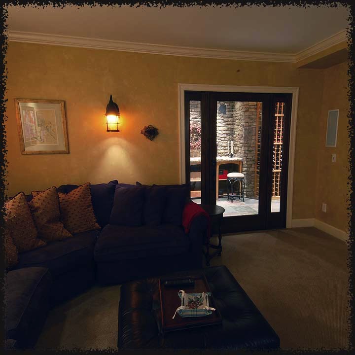 The lower level wine room adjoins the an entertainment room.