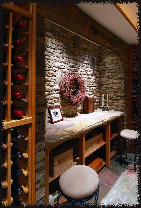 A niche in the house's foundation was lined in stacked stone to match elsewhere in home.  A distressed wood beam adds detail and conceals lighting.